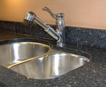 quartz countertop and stainless steel sink
